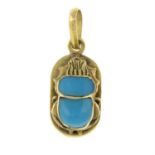 A blue paste scarab pendant.