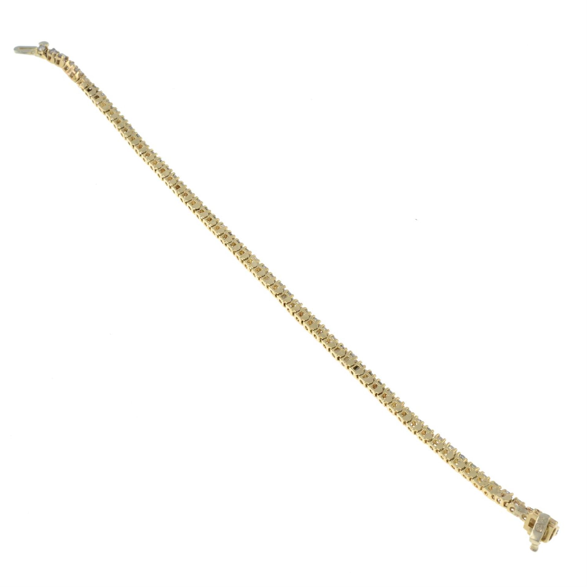 A 14ct gold brilliant-cut diamond line bracelet. - Image 2 of 2