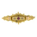 An early 20th century 9ct gold garnet-topped-doublet and rose-cut diamond brooch.