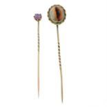 Two gem-set stickpins.