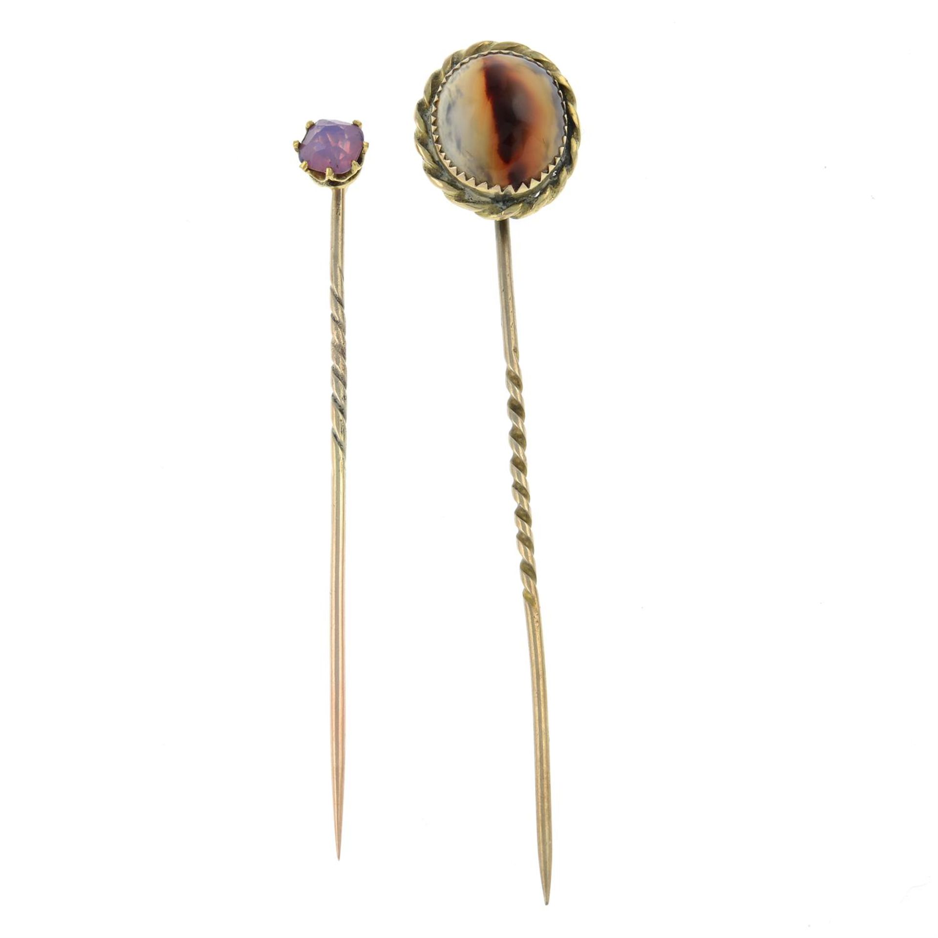 Two gem-set stickpins.