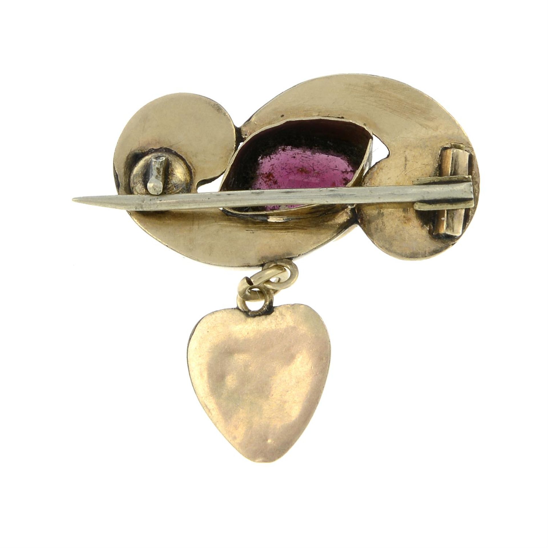 A late 19th century gold garnet brooch, suspending a heart drop. - Image 2 of 2