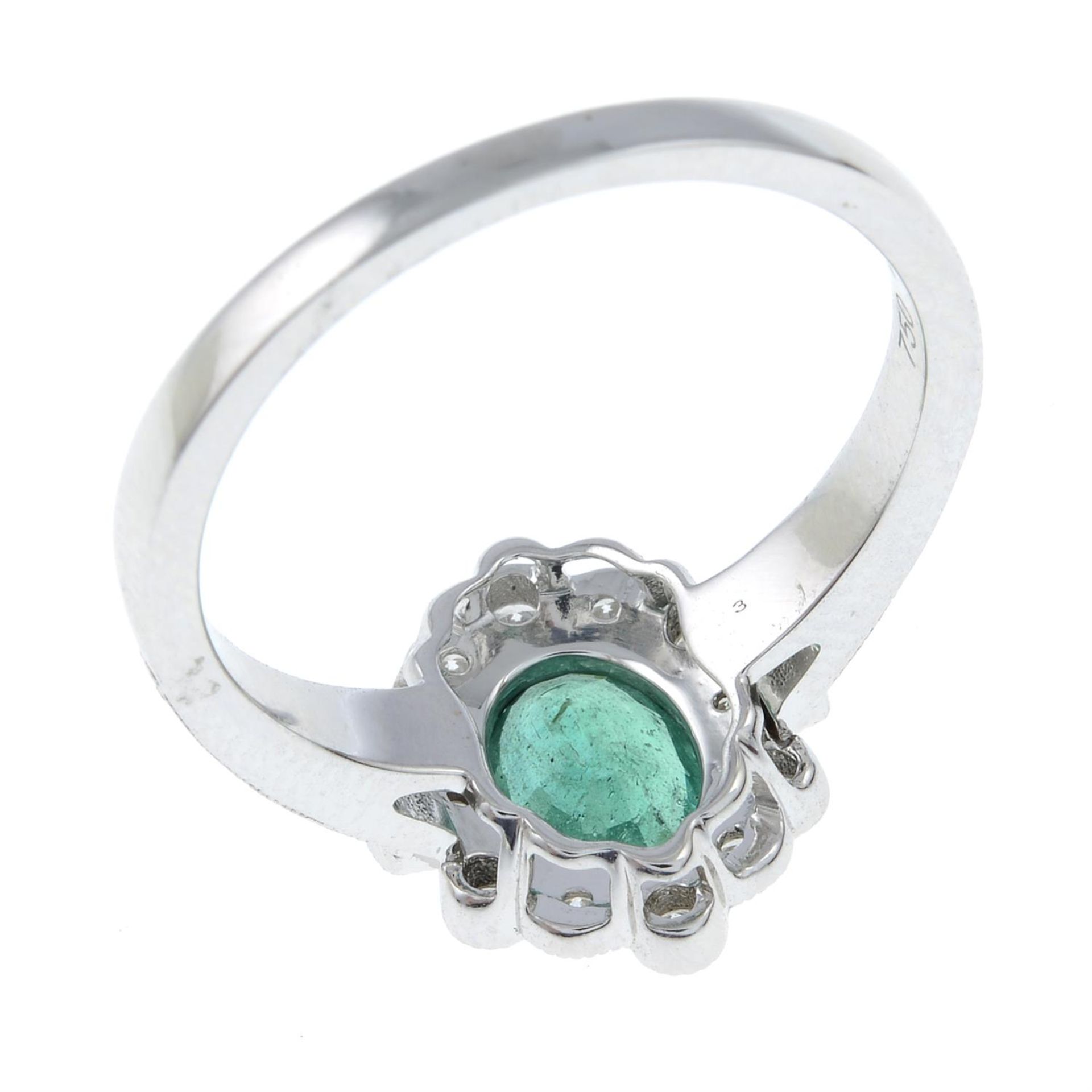 An 18ct gold emerald and diamond cluster ring. - Image 3 of 3