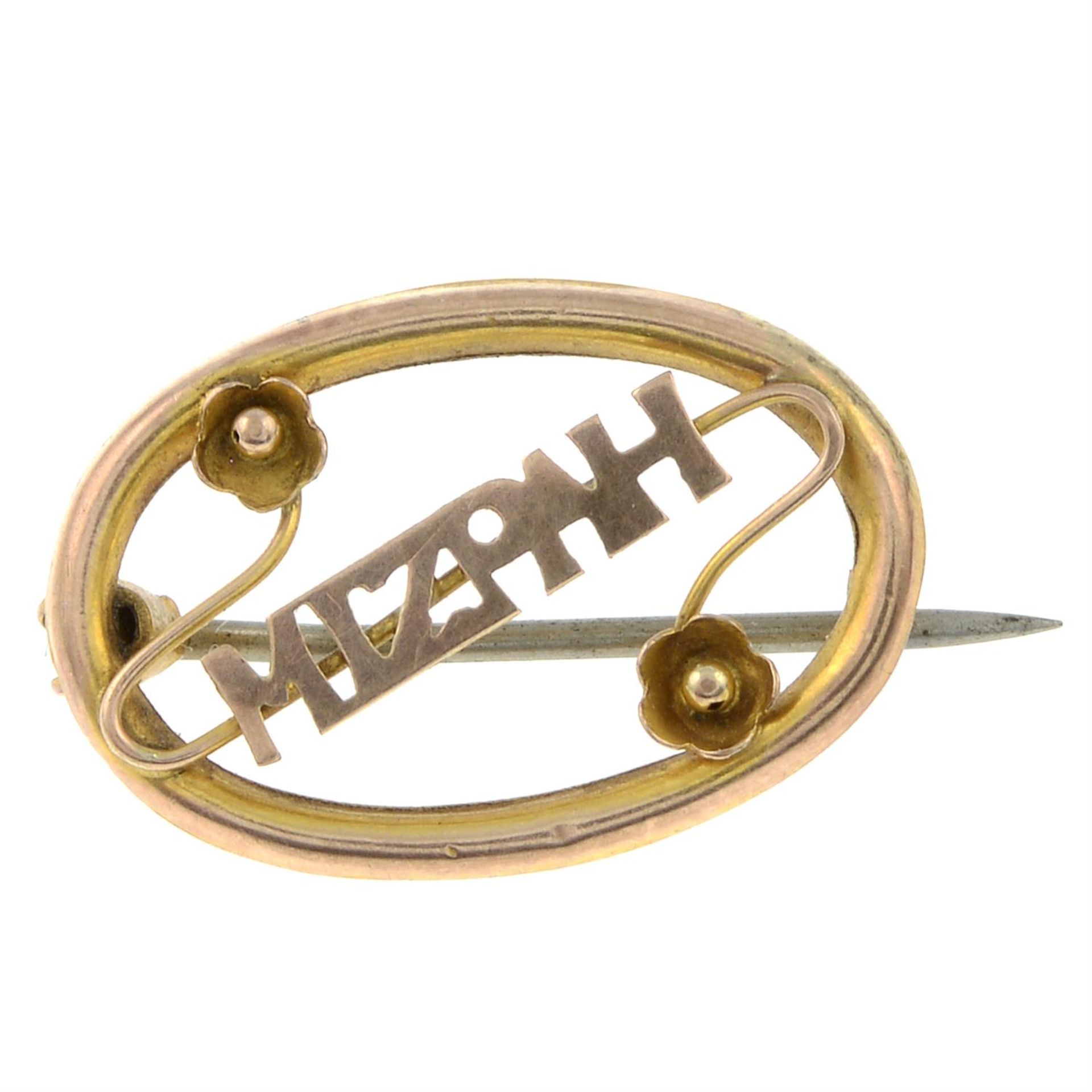 An early 20th century 9ct gold Mizpah brooch.