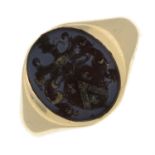 A chalcedony intaglio signet ring.