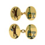 A pair of 9ct gold and enamel cufflinks, depicting 'Men's two vices, gambling and alcohol',