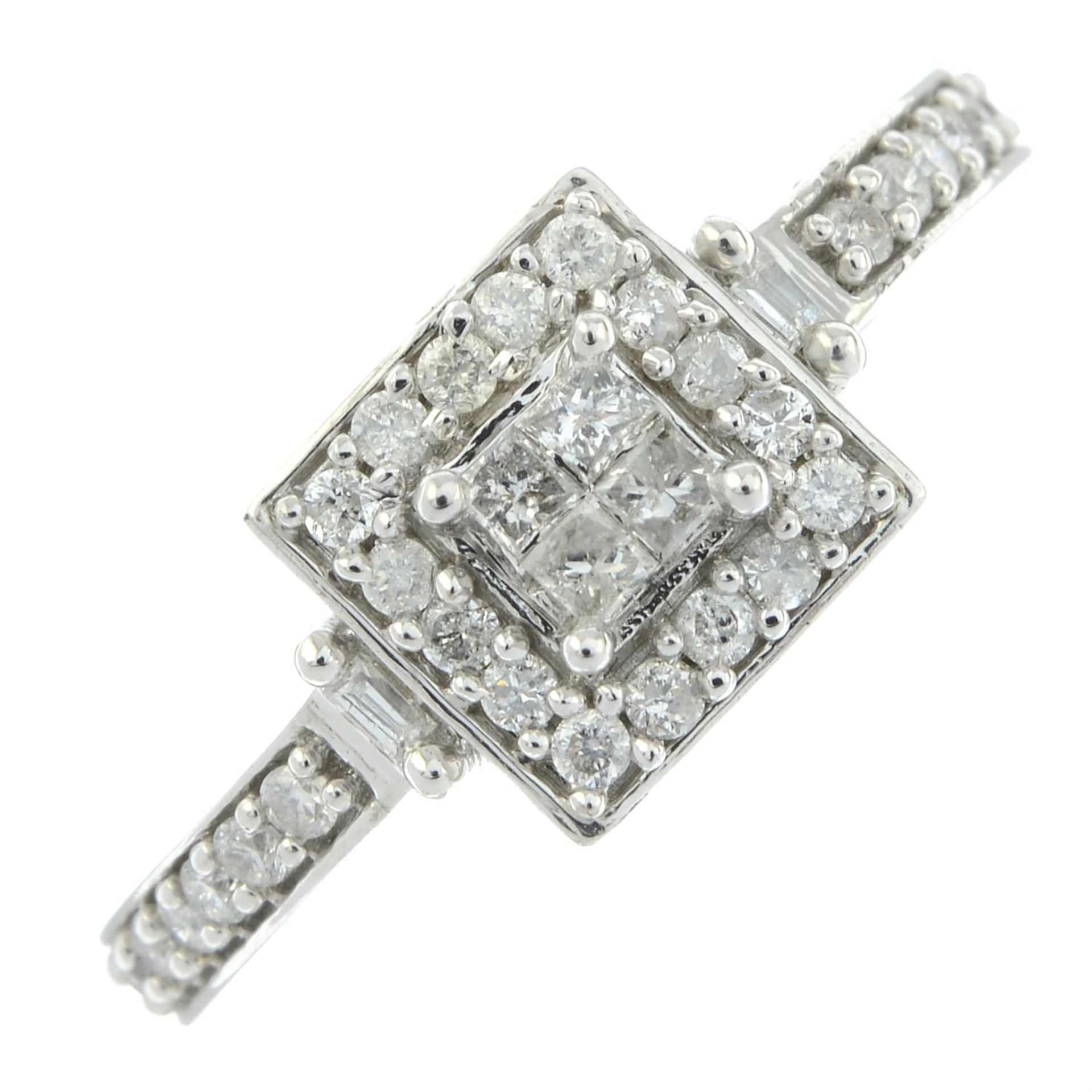 A 9ct gold brilliant-cut and square-shape diamond dress ring.