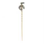 An early 20th century old-cut diamond horseshoe and riding crop stickpin.