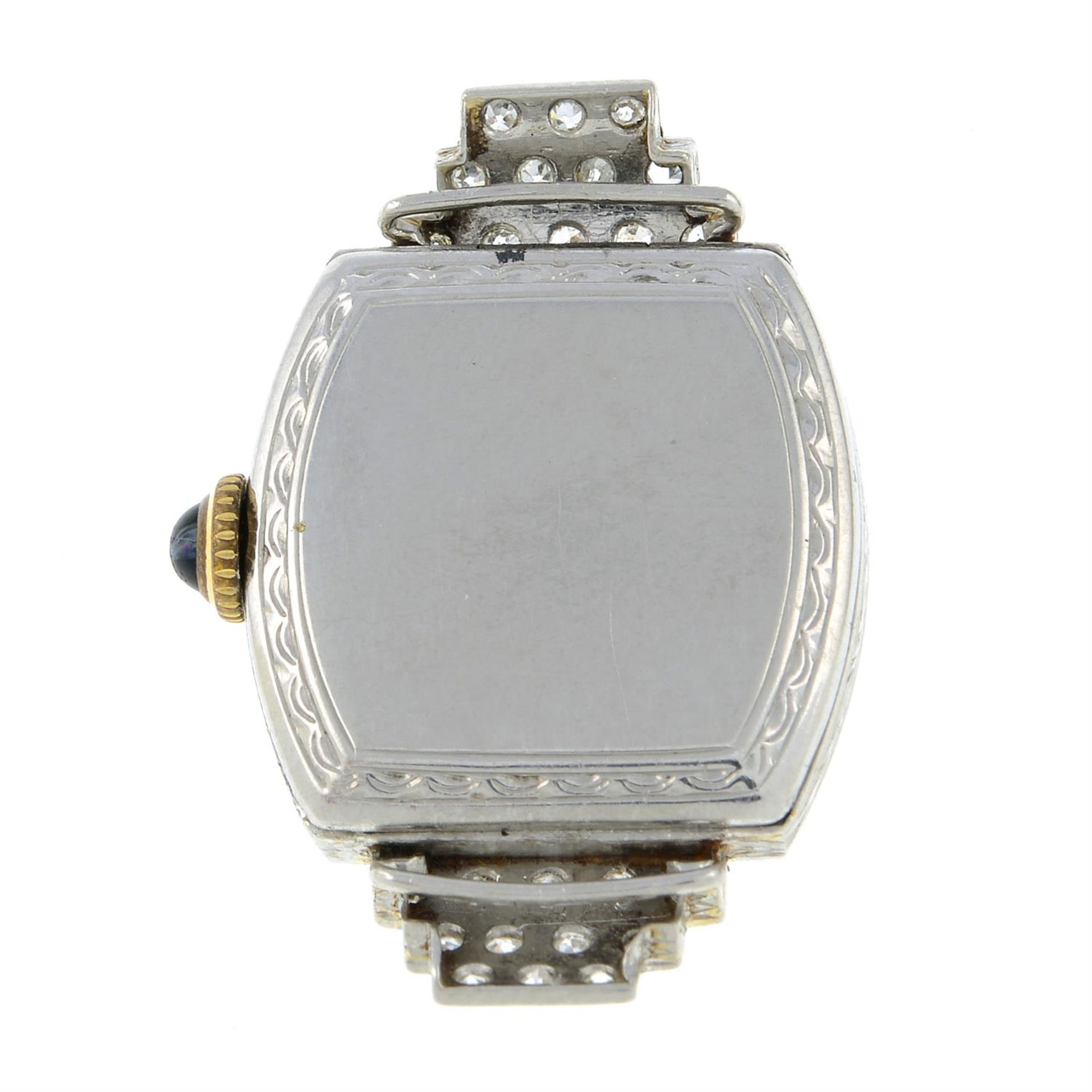 A mid 20th century platinum single-cut diamond watch head. - Image 2 of 2