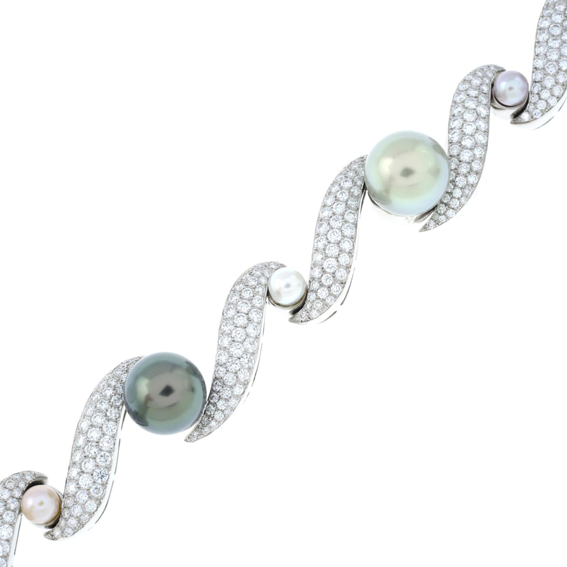A vari-hue 'South Sea' cultured pearl and pavé-set diamond scroll bracelet, with vari-hue cultured - Image 4 of 5