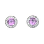 A pair of 18ct gold pink sapphire and diamond cluster earrings.