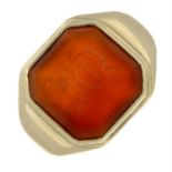 A carved carnelian signet ring.
