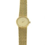 A lady's 18ct gold wrist watch, by Omega.