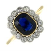 An early 20th century sapphire and diamond cluster ring.
