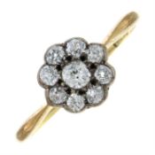 An early 20th century 18ct gold old-cut diamond floral cluster ring.