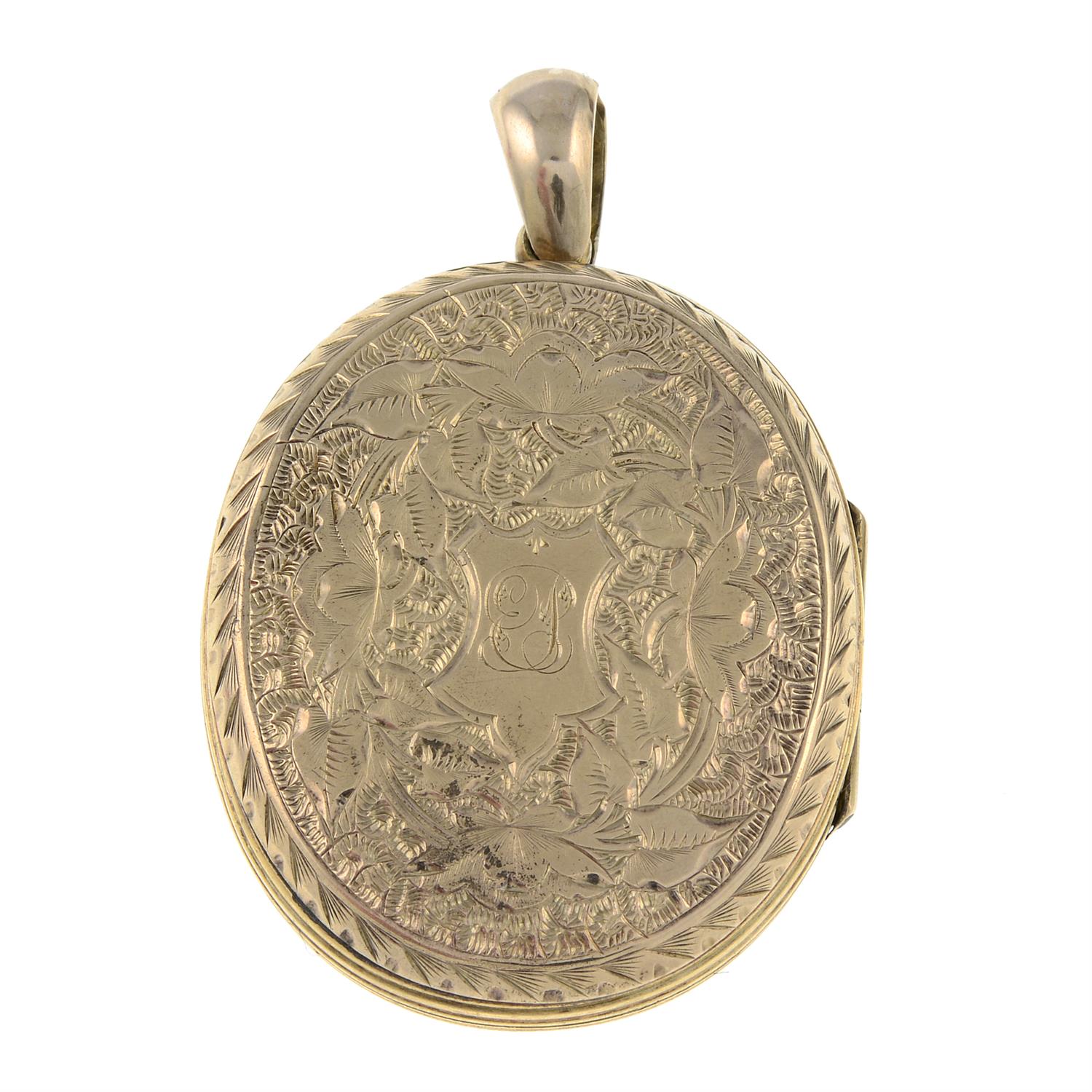 A 9ct gold late Victorian locket with engraved floral decoration. - Image 2 of 2