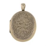 A 9ct gold late Victorian locket with engraved floral decoration.