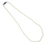 A cultured seed pearl necklace with gold rose-cut diamond clasp. AF.