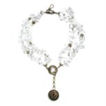 A silver rock crystal bracelet, by Hoorieh Coish.