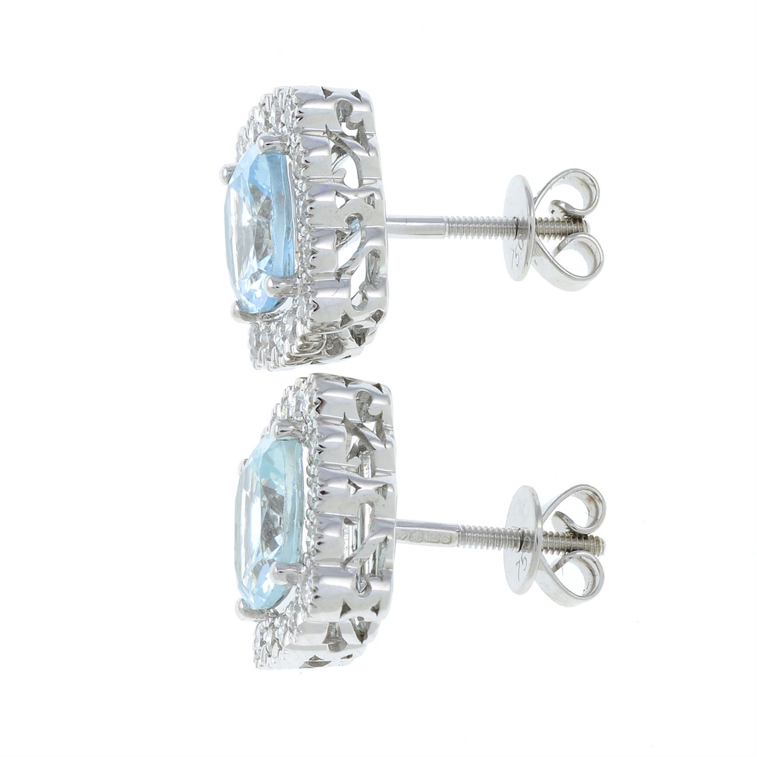 A pair of 18ct gold aquamarine and diamond square-shape cluster earrings. - Image 2 of 2