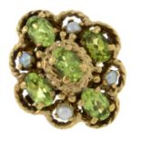 A 1970s 9ct gold peridot and split pearl dress ring.