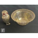 A hallmarked silver pierced bowl terminating in crimped border, diameter 16cm, weight 4oz,