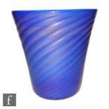 A Flavio Poli for Seguso Incamiciato glass vase of tumbler form cased in blue with gold aventurine