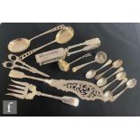 A small parcel lot hallmarked silver and silver plated flat ware to include asparagus servers,