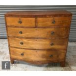 A George IV mahogany bow-fronted chest of two short over three long cock-beaded drawers, raised to