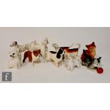 Eight assorted Beswick dogs and cats to include a poodle, bulldog and a dalmatian together with a