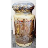 A large 19th century pharmaceutical apothecary glass drug jar and cover, the painted yellow ground