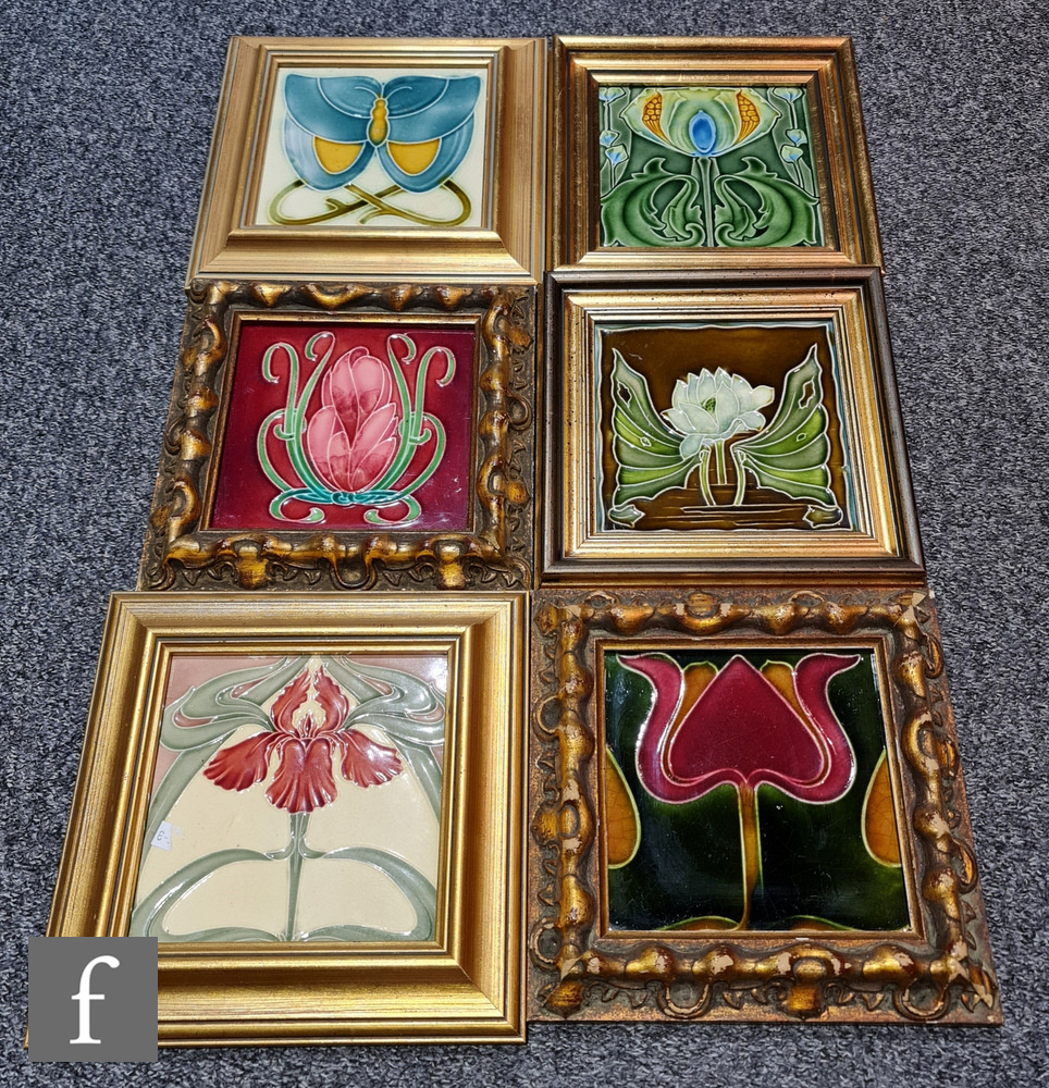 Six assorted late 19th to early 20th Century framed Art Nouveau 6in dust pressed tiles each with