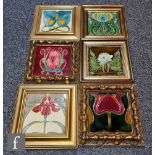 Six assorted late 19th to early 20th Century framed Art Nouveau 6in dust pressed tiles each with