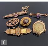 A small parcel lot of 9ct jewellery to include five brooches and a lady's wrist watch, total