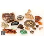 A collection of rock specimens to include amethysts, geodes, polished agates and fossils etc. (qty)
