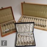A cased set of twelve Dutch silver teaspoons each with a windmill to terminal with a matched set