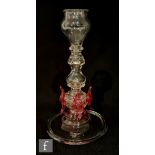 An early 20th Century clear crystal glass candlestick in the manner of Salviati, the multiple