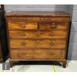 A 19th Century mahogany chest of two short over three long cock-beaded drawers, raised to bracket