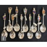 A set of ten 20th Century Queen's Unique Beasts silver spoons, with assorted finials depicting