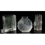 A collection of three post war Skruf glass vases designed by Bengt Edenfalk, all moulded with a