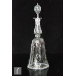 A late 19th Century decanter of bell form, possibly Stevens and Williams, intaglio cut and