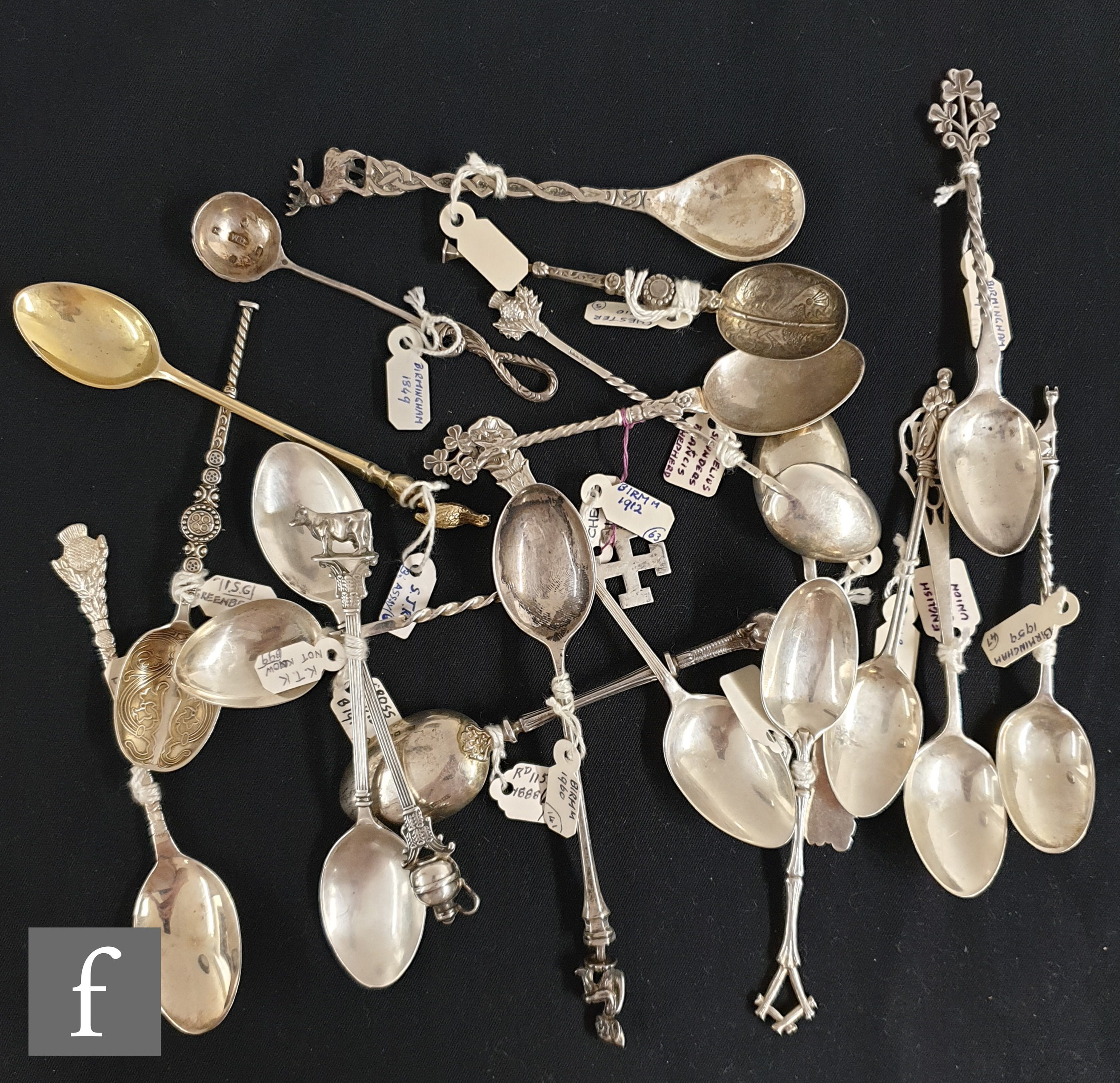 A collection of various Victorian and later silver spoons, with figural and animal finials, dates