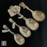 Three Georgian and later fiddle pattern caddy spoons, two with bright cut decoration to bowls,