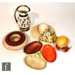 Five pieces of assorted 1930s Art Deco pottery comprising a Solian Ware wall pocket, a Myott nut