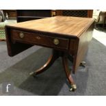 A late Regency period mahogany drop leaf supper table with brass line inlaid detail, fitted with a