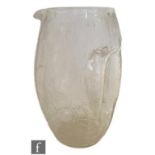 A Kralik barrel form jug with integral handle and a crackle glass finish after designs by Kolomon