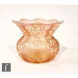 A late 19th Century Thomas Webb cameo glass posy bowl of compressed form with flared wavy rim, cased
