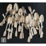 A collection of Georgian and Victorian silver teaspoons, mostly fiddle pattern, various dates