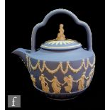 A later 20th Century Wedgwood Heritage Collection blue Jasperware rum kettle, second in a series,