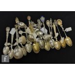 A collection of Victorian and later silver teaspoons, each with assorted finials including Edward